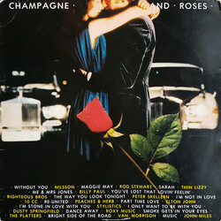 Various Champagne And Roses