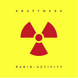 Kraftwerk Radioactivity REISSUE LIMITED HEAVYWEIGHT TRANSLUCENT YELLOW VINYL LP + 16 PAGE BOOKLET