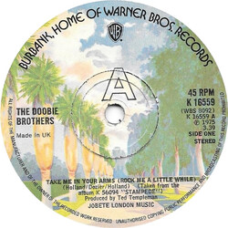 The Doobie Brothers Take Me In Your Arms (Rock Me A Little While) USED VINYL 7INCH 45 RPM SINGLE