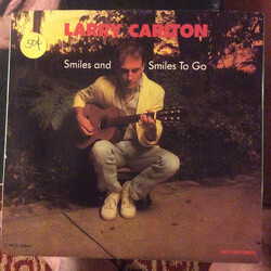 Larry Carlton Smiles And Smiles To Go USED VINYL 7INCH 45 RPM STEREO SINGLE PROMO