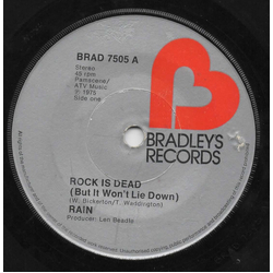 Rain (17) Rock Is Dead (But It Won't Lie Down) Vinyl 7" USED