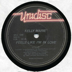 Kelly Marie Feels Like I'm In Love / Love's Got A Hold On You USED VINYL 12INCH 33 S RPM