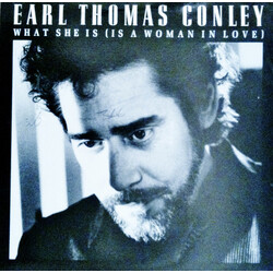 Earl Thomas Conley What She Is (Is A Woman In Love) USED VINYL 7INCH 45 RPM