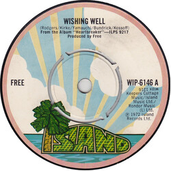 Free Wishing Well USED VINYL 7INCH SINGLE