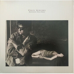 Paul Young Between Two Fires Vinyl LP USED