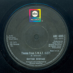 Rhythm Heritage Theme From S.W.A.T. / I Wouldn't Treat A Dog (The Way You Treated Me) USED VINYL 7INCH 45 RPM