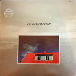 Jan Garbarek Group Photo With Blue Sky, White Cloud, Wires, Windows And A Red Roof Vinyl LP USED