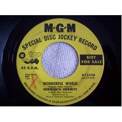 Herman's Hermits Wonderful World / Traveling Light Vinyl 7" USED